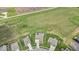 An aerial shot showcasing the home and its surrounding greenery in a quiet neighborhood at 920 Alba Dr, Lebanon, IN 46052
