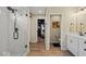 Modern bathroom features a glass-enclosed shower with matte black hardware and tiled walls at 920 Alba Dr, Lebanon, IN 46052