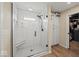 Elegant bathroom shower with glass door, rain shower head, and tiled walls at 920 Alba Dr, Lebanon, IN 46052