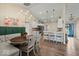 Dining area features a banquette seat and a stylish chandelier at 920 Alba Dr, Lebanon, IN 46052