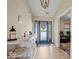 Bright and inviting foyer with blue front door and modern decor at 920 Alba Dr, Lebanon, IN 46052