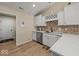 This kitchen features bright cabinets, stainless appliances, and white countertops at 920 Alba Dr, Lebanon, IN 46052