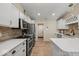Kitchen features a gas range, island, stainless steel appliances, and ample counter space at 920 Alba Dr, Lebanon, IN 46052