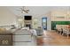 Open-concept living room with fireplace, lots of natural light, and stylish furnishings at 920 Alba Dr, Lebanon, IN 46052