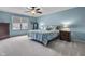 Bedroom with ample natural light, ceiling fan, and a comfortable bed at 952 Workington Cir, Westfield, IN 46074