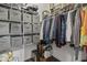 Organized walk-in closet with shelving units and hanging rods for storage at 952 Workington Cir, Westfield, IN 46074
