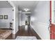 Welcoming entryway with hardwood floors and a clear view into the adjacent living spaces at 952 Workington Cir, Westfield, IN 46074