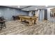 Finished basement game room features a pool table and shuffleboard at 952 Workington Cir, Westfield, IN 46074