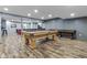 Finished basement game room features a pool table and shuffleboard at 952 Workington Cir, Westfield, IN 46074
