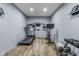 Home gym features wood-look floors and exercise equipment including a treadmill and exercise bike at 952 Workington Cir, Westfield, IN 46074