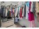 Walk-in closet featuring plenty of hanging space for clothes, a built-in bench, and plenty of room at 952 Workington Cir, Westfield, IN 46074