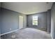 Spacious bedroom with carpeted floor, a closet and a window at 9613 W Stargazer Dr, Pendleton, IN 46064