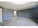 Carpeted bedroom with painted gray walls and light color trim at 9613 W Stargazer Dr, Pendleton, IN 46064