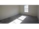 Neutral bedroom with carpeted floor and a window at 9613 W Stargazer Dr, Pendleton, IN 46064