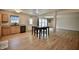 Eat-in kitchen with stainless steel appliances, wood floors, and table at 9613 W Stargazer Dr, Pendleton, IN 46064
