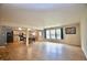 Open-concept living space with kitchen, dining area, and multiple windows for natural light at 9613 W Stargazer Dr, Pendleton, IN 46064