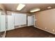 Versatile space with brown carpet, white doors and a large white board for office or workout room at 9790 Summerlakes Dr, Carmel, IN 46032