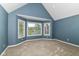 Bedroom featuring a bay window, neutral carpet, and light walls at 9790 Summerlakes Dr, Carmel, IN 46032