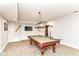 Finished basement game room with pool table, pool cue rack, and accent lighting at 9790 Summerlakes Dr, Carmel, IN 46032