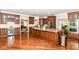 Large kitchen with granite counters, stainless appliances, custom cabinetry, and hardwood floors, perfect for entertaining at 9790 Summerlakes Dr, Carmel, IN 46032