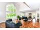 Bright living room featuring hardwood floors, fireplace and lots of natural light at 9790 Summerlakes Dr, Carmel, IN 46032