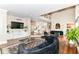 Large living room boasts hardwood floors and an open, airy layout at 9790 Summerlakes Dr, Carmel, IN 46032
