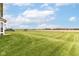 Expansive backyard features a well-maintained lawn and plenty of space at 9860 Gallop Ln, Fishers, IN 46040