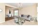 Open-concept living room and dining area with elegant furniture and natural light at 9860 Gallop Ln, Fishers, IN 46040