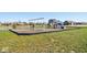 Well-maintained community playground for recreation and fun, with swings and play structure at 9860 Gallop Ln, Fishers, IN 46040