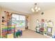 Charming playroom with a bright window and delightful toys at 9860 Gallop Ln, Fishers, IN 46040