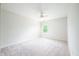 An airy bedroom showcases neutral walls, plush carpeting, and ample natural light at 10075 Niagara Dr, Fishers, IN 46037