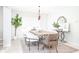 Bright dining room featuring a stylish table, modern chairs, and an elegant mirror for added charm at 10075 Niagara Dr, Fishers, IN 46037