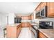 The warm, inviting kitchen boasts stainless steel appliances and ample cabinet space at 10075 Niagara Dr, Fishers, IN 46037