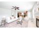 Spacious living room with an open layout, connecting seamlessly to the kitchen and dining area at 10075 Niagara Dr, Fishers, IN 46037