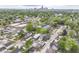 Aerial view showcasing the home's proximity to urban amenities and lush, green surroundings at 1043 N Beville Ave, Indianapolis, IN 46201