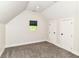Bright bedroom featuring neutral paint, carpet, and two closets, offering a clean and inviting space at 1043 N Beville Ave, Indianapolis, IN 46201