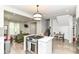 Modern open-concept kitchen and living room perfect for entertaining, complete with stainless steel appliances at 1043 N Beville Ave, Indianapolis, IN 46201