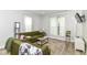 Cozy living room with lots of natural light, featuring hardwood floors and comfortable seating at 1043 N Beville Ave, Indianapolis, IN 46201