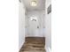 Bright hallway with hardwood floors leading to the main living areas at 10551 Huckleberry Ct, Noblesville, IN 46060
