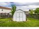Backyard shows a shed with double doors, surrounded by a well-maintained lawn and a wooden fence at 10551 Huckleberry Ct, Noblesville, IN 46060