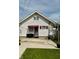 Back of house with patio and grill at 106 S Denny St, Indianapolis, IN 46201
