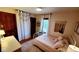 Adorable bedroom featuring soft pink accents, a white iron bed, and decorative wall hangings at 1102 Redwood Dr, Brownsburg, IN 46112