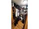 Walk-in closet with custom shelving and ample storage space at 1102 Redwood Dr, Brownsburg, IN 46112