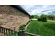 Exterior view of the property with brick, a manicured lawn, and a sidewalk at 1102 Redwood Dr, Brownsburg, IN 46112