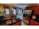Open kitchen with stainless steel appliances, a breakfast nook, and backyard access at 1102 Redwood Dr, Brownsburg, IN 46112