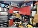 Organized workspace with red cabinets and workbench area at 1102 Redwood Dr, Brownsburg, IN 46112