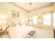 Charming bedroom with soft colors, ample natural light, and a cozy vanity area at 1105 Deer Creek Dr, Anderson, IN 46011