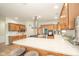 Spacious kitchen with stainless steel appliances, ample counter space, and a large island at 1105 Deer Creek Dr, Anderson, IN 46011