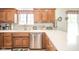 Bright kitchen featuring stainless steel appliances, quartz countertops, and stylish cabinets at 1105 Deer Creek Dr, Anderson, IN 46011