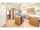 Well-equipped kitchen with stainless steel appliances, central island, and ample counter space at 1105 Deer Creek Dr, Anderson, IN 46011
